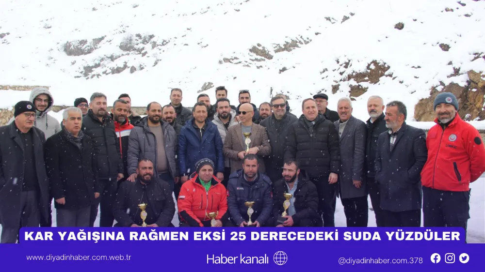 KAR YAĞIŞINA RAĞMEN EKSİ 25 DERECEDEKİ SUDA YÜZDÜLER.